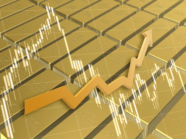 金の延べ棒と株価チャート